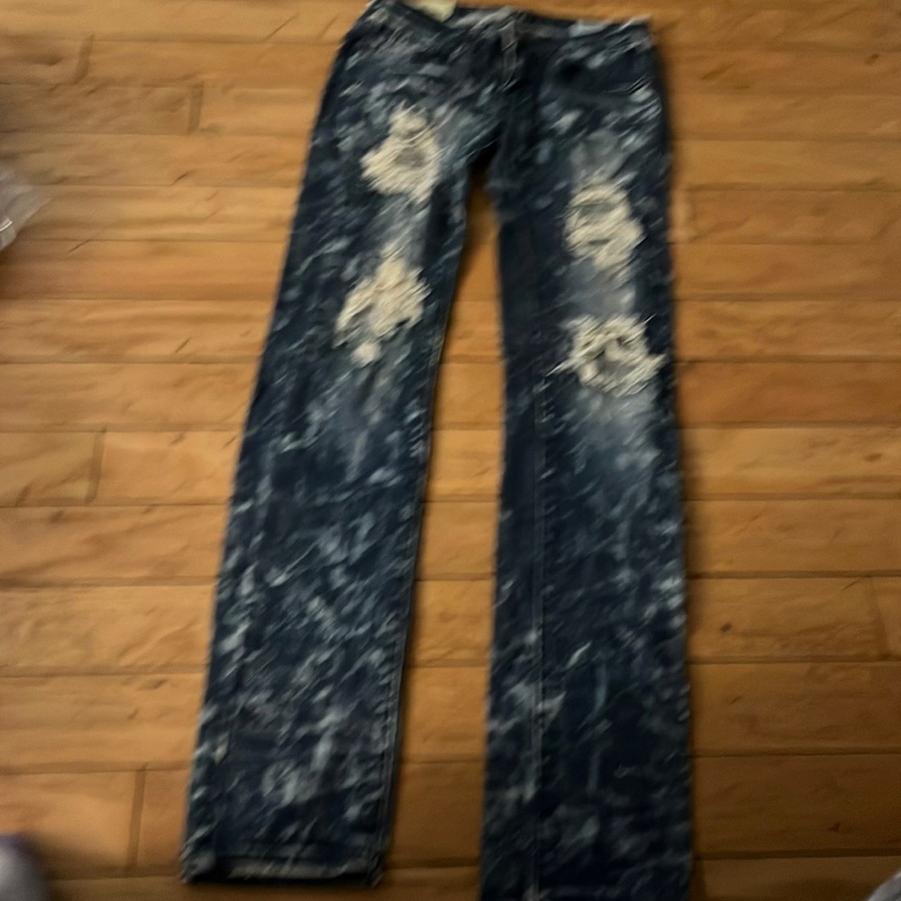 Machine distressed jeans